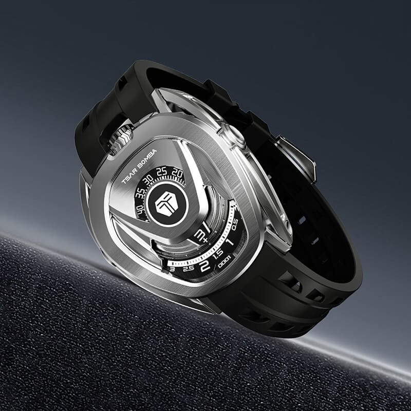 TSAR BOMBA Reactor TB8213 staless steel Automatic Interchangeable Men's Watch. Features a sliver stainless steel case and bezel, powered by a Japanese automatic movement. Top dial: minutes; central dial: seconds. Bottom main display: hour hand = pointer reading + central window reading. The TB8213 utilizes the TSAR BOMBA interchangeable module system, allowing for quick and tool-free changes of the strap, bezel, and crown.black strap