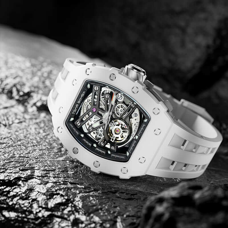 TSAR BOMBA Elemental TB8208C men’s White Black tonneau watch with a stainless steel case and white ceramic bezel and black skeleton dial and white strap.
