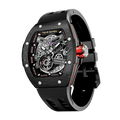 TSAR BOMBA Atomic automatic-skeleton-tonneau-men-watch-TB8218cf- Carbon fiber black bezel, Left three-quarter-view; Features a carbon fiber bezel and an interchangeable fluoro-rubber strap. It utilizes TSAR BOMBA’s patented technology, allowing for the tool-free, rapid swapping of the strap, bezel, and crown. Since your watch can change its style, why buy another one?