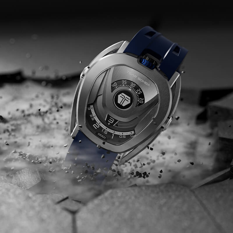 TSAR BOMBA Reactor TB8213 staless steel Automatic Interchangeable Men's Watch. Features a sliver stainless steel case and bezel, powered by a Japanese automatic movement. Top dial: minutes; central dial: seconds. Bottom main display: hour hand = pointer reading + central window reading. The TB8213 utilizes the TSAR BOMBA interchangeable module system, allowing for quick and tool-free changes of the strap, bezel, and crown.blue strap
