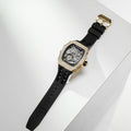 TSAR BOMBA Elemental TB8208D men’s Black tonneau watch with a gold-tone stainless steel case and cubic zirconia bezel and skeleton dial.