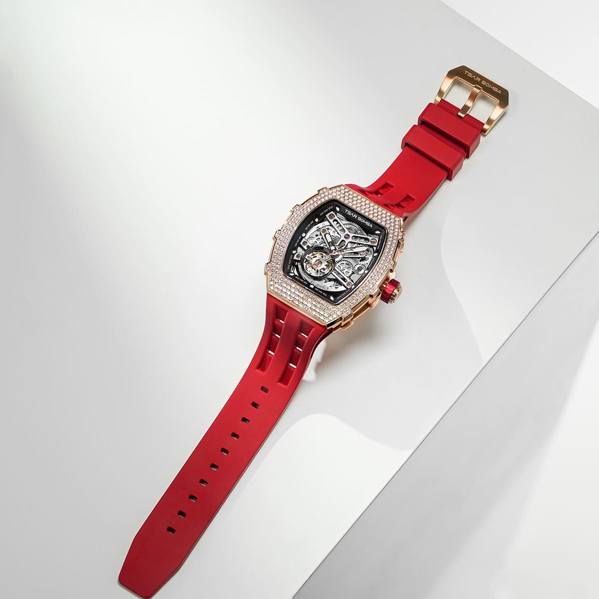 TSAR BOMBA Elemental TB8208D men’s Black tonneau watch with a gold-tone stainless steel case and cubic zirconia bezel and skeleton dial.
