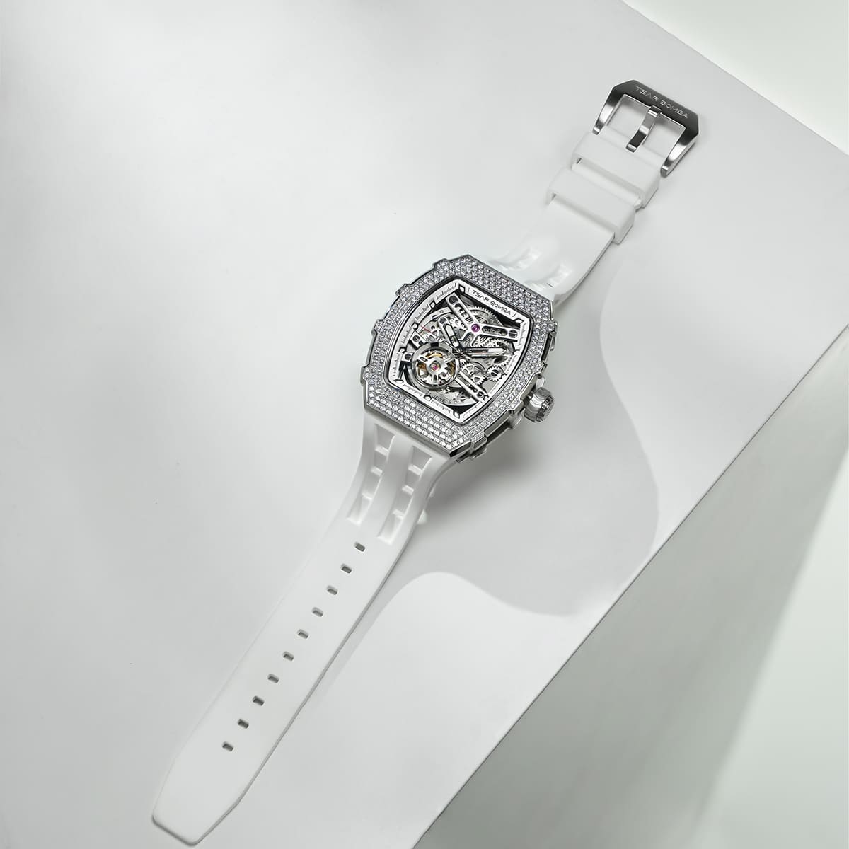 TSAR BOMBA Elemental TB8208D men’s Black tonneau watch with a gold-tone stainless steel case and cubic zirconia bezel and skeleton dial.