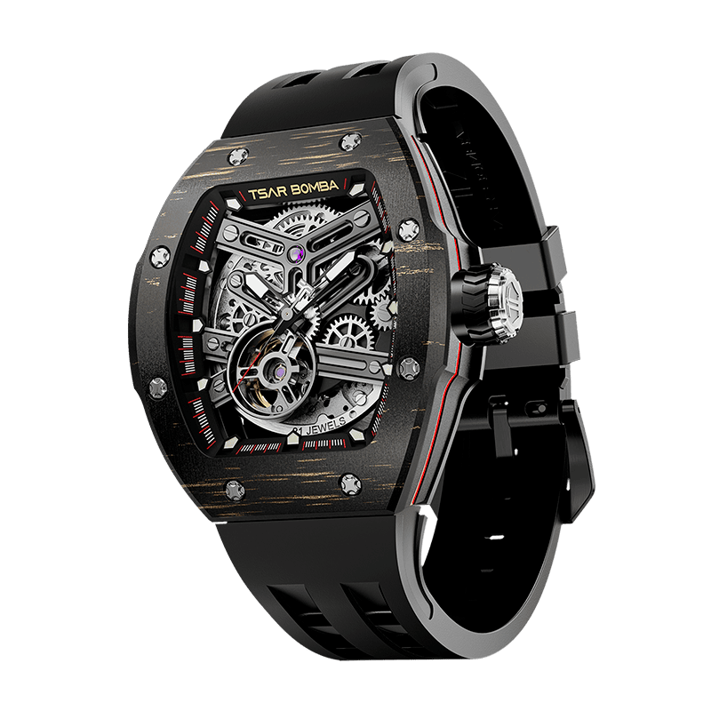 TSAR BOMBA Atomic automatic-skeleton-tonneau-men-watch-TB8218cf- Carbon fiber gold bezel and black strap, Left three-quarter-view; Features a carbon fiber bezel and an interchangeable fluoro-rubber strap. It utilizes TSAR BOMBA’s patented technology, allowing for the tool-free, rapid swapping of the strap, bezel, and crown. Since your watch can change its style, why buy another one?