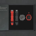 The image shows the TSAR BOMBA Atomic TB8214 interchangeable set. The set includes a black and red fluororubber strap, a black and red fluororubber bezel, and a red and black crown. TSAR BOMBA's patented interchangeable module allows for quick and easy replacement of watch modules without tools, enabling interchangeable straps, crowns, and bezels. Instead of buying multiple watches, why not own one watch that can be styled in various ways?
