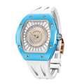 TSAR BOMBA Nucleus femme 03 Ceramic Ladies' Watch. Features a ceramic case and a ceramic dial set with a zirconia diamond. Powered by a Swiss Ronda quartz movement. Extremely lightweight (approximately 60 grams). Equipped with Grade A luminous coating, scratch-resistant sapphire crystal, and a replaceable fluoroelastomer strap. Water resistant to 50 meters (5 ATM). blue bezel and white strap.--Left three-quarter-view