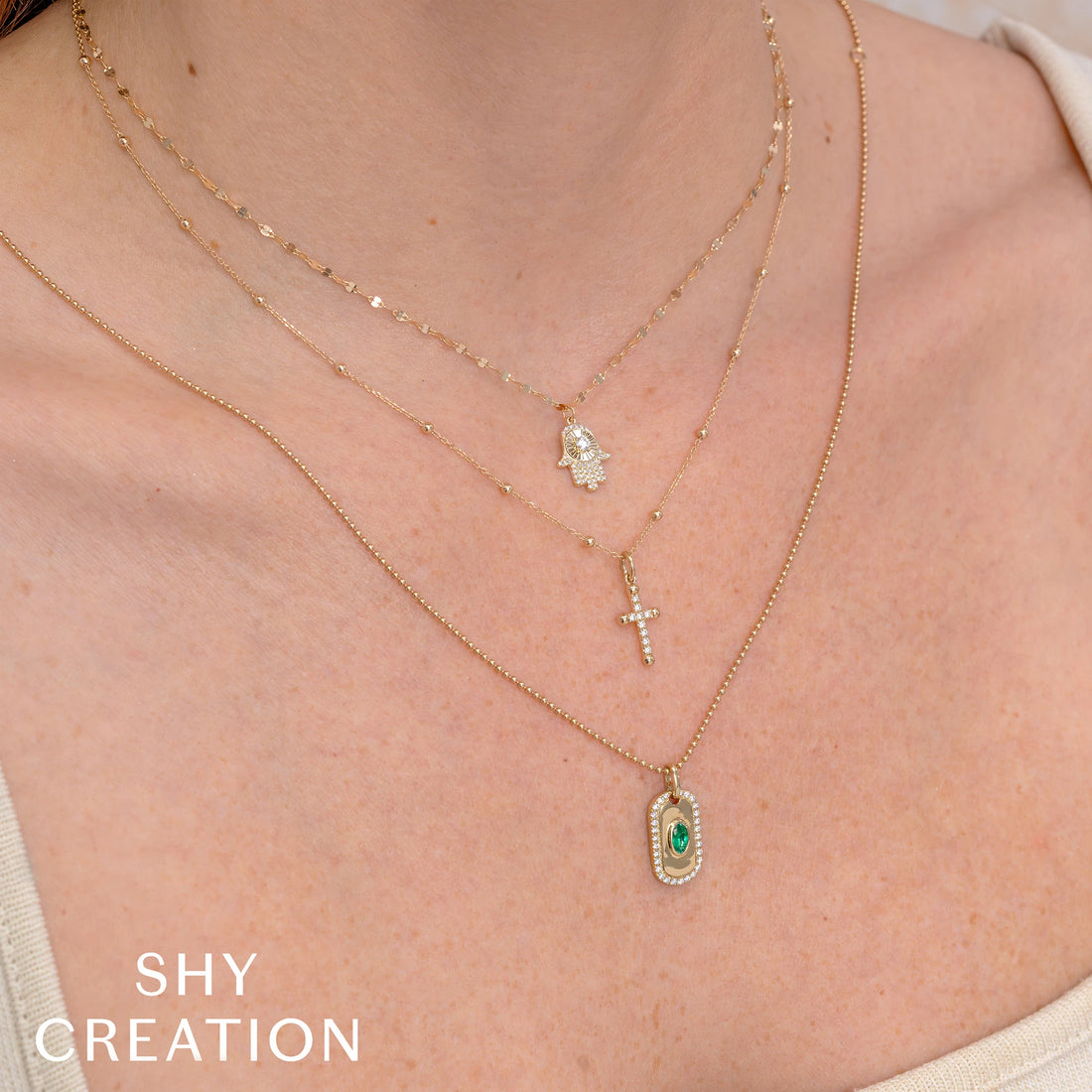 0.08CT 14K Y/G DIAMOND CROSS NECKLACE